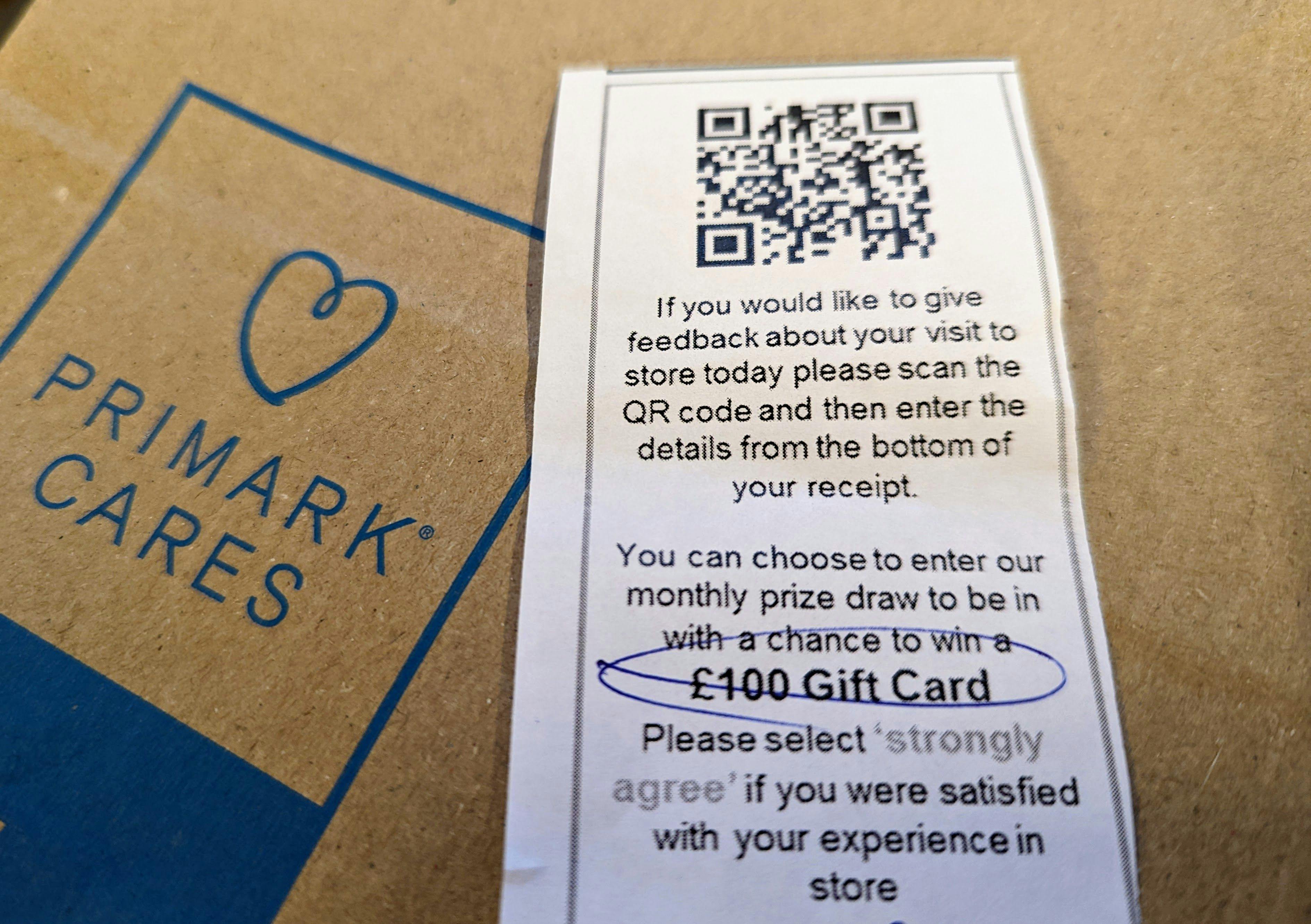 A note handed out in a Primark store asking customers to pick a particular survey option